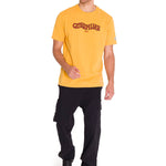 Polera Manga Corta Casual Hombre HERITAGE 1925 GRAPHIC TEE Amarilla Cat